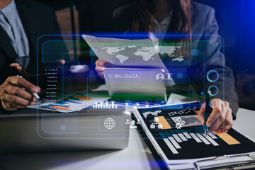 Businessman hands working on network and digital finance marketing chart with future technology innovation and digital transformation concept.