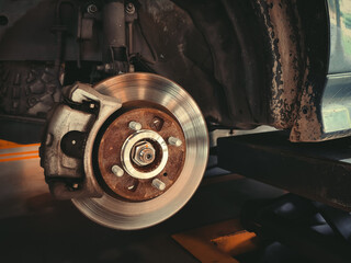 Disk brake on car, in process of new tire replacement.	 - obrazy, fototapety, plakaty
