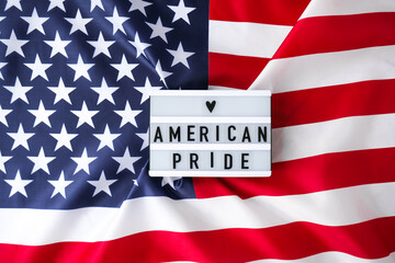American flag. Lightbox with text AMERICAN PRIDE Flag of the united states of America. July 4th...