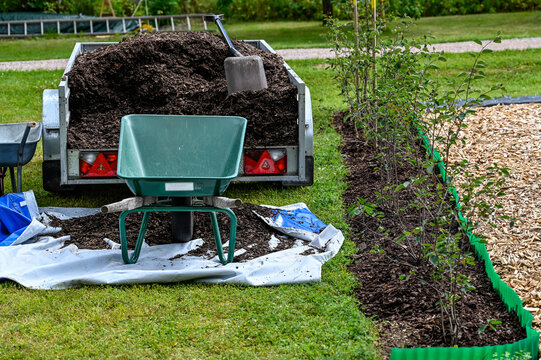 Trailer Full Of Mulch And A Shovel