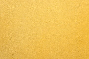 Fototapeta na wymiar Yellow sand abstract background banner