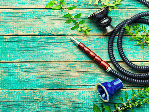 Smoking hookah with fresh mint