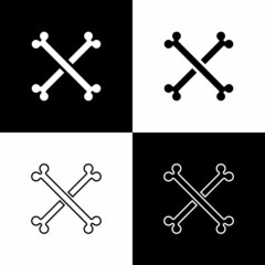 Set Crossed human bones icon isolated on black and white background. Vector