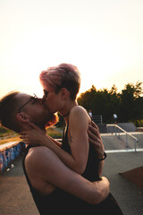 Couple kissing each other outdoor
