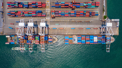 Fototapeta na wymiar Aerial view container ship in port at container terminal port, Ship of container ship stand in terminal port on loading, unloading container, Commercial cargo ship in sea port.