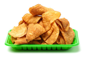 Stack of beet potato chips on white background