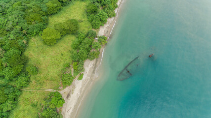 Aerial top down view of a Japanese transport shipwreck from World War 2 on Guadalcanal island.