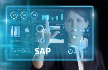 Business, Technology, Internet and network concept. Young businessman working on a virtual screen of the future and sees the inscription: SAP