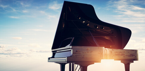 Grand piano on sunset sky background © Photocreo Bednarek