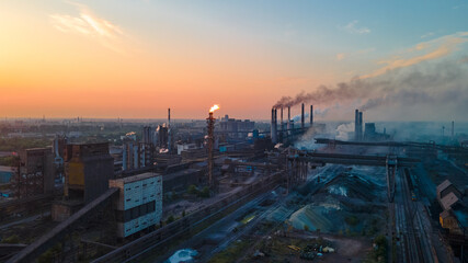 Fototapeta na wymiar metallurgical plant heavy industry poor ecology top view smoke from chimneys smog