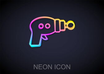 Glowing neon line Ray gun icon isolated on black background. Laser weapon. Space blaster. Vector