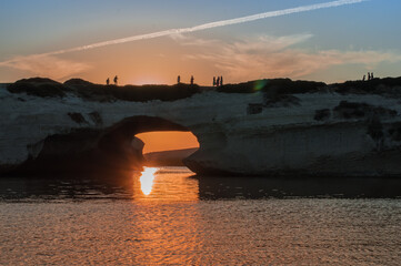 nature arch S'Archittu on Sardinia island at sunset