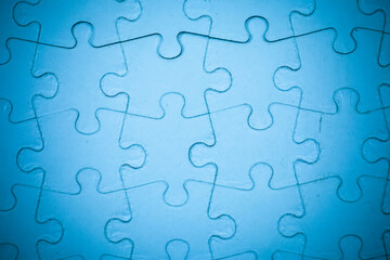 Blue Jigsaw puzzle background.