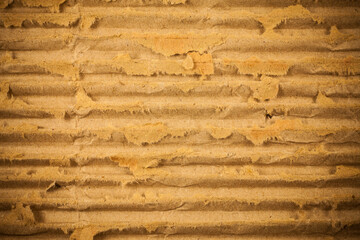 Brown cardboard torn crumpled.