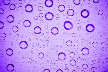 Water bubble on .purple glass.