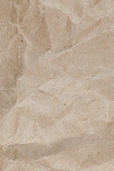 Textured crumpled packaging brown paper background.