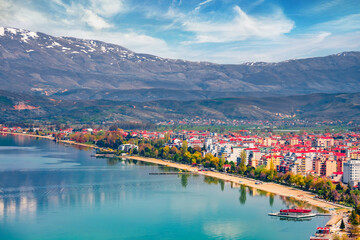 Incredibl spring cityscape of Pogradec town. Wonderful outdoor scene of Ohrid lake. Spectacular morning view of Albania, Europe. Traveling concept background..