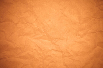 Crumpled brown paper background.
