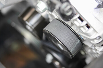 Close up of car engine with auxiliary belt