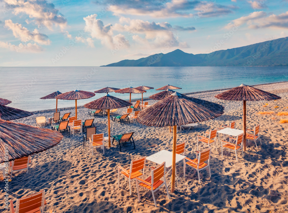 Wall mural Small restaurant on Plakas beach, Leonidio town location. Colorful morning seascape of Mediterranean sea. Attractive outdoor scene of Peloponnese peninsula, Greece, Europe.