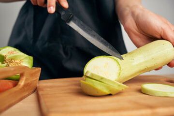 cutting vegetables in the kitchen cooking healthy eating close-up