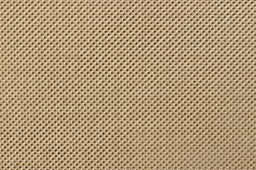 Bright yellow checkered fabric material texture close-up background.