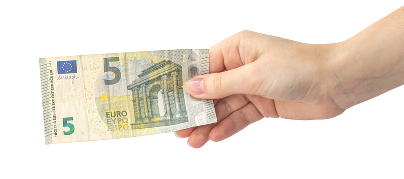 5 euro in hand isolated on white background, woman hand with banknote, europe money banner photo