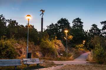 Stockholm, Sweden A statue by Carl Milles on the Lidingo island and the Lidingo bridge at dawn.