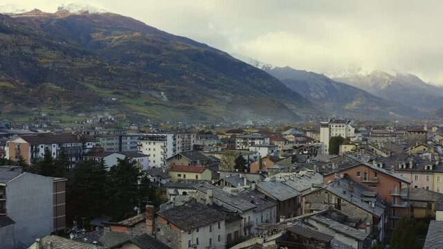 A majestic look of the Valle d&rsquo;Aosta, Italy, with amazing clave of mountains, and rooftops, Drone view.