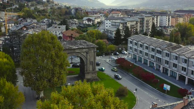 A mesmerizing view of the Valle d&rsquo;Aosta, with the amazing Arch of Augustus, a monument in the city of Aosta, northern Italy, A Drone view.