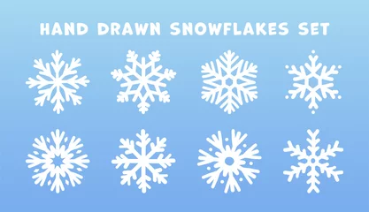 Fotobehang Set of hand drawn doodle snowflakes icons on blue background. New year and winter simple symbol, cute snowflake for print, web, design, decoration, logo or mobile app © Ketmut