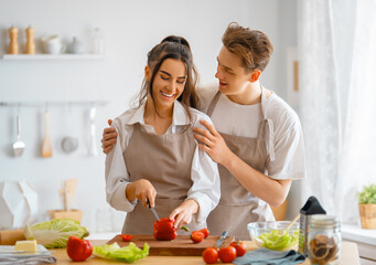 loving couple is preparing the proper meal