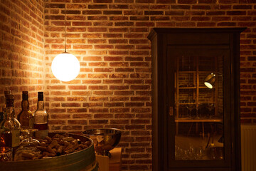 wine basement with brick walls and dim lights