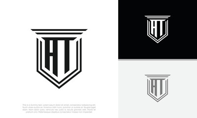 Initials AT logo design. Luxury shield letter logo design.