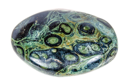 Macro mineral stone jasper kambaba on a white background