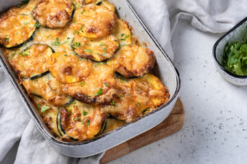 casserole with zucchini squash and cheese in baking dish