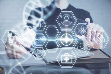 Double exposure of man hands holding a credit card and DNA drawing. On-line Education and...