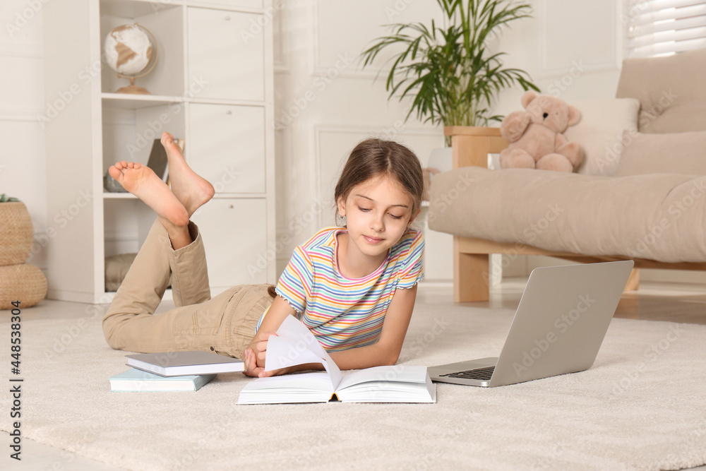 Sticker Girl with laptop and books lying on floor at home