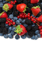 Blackberry, raspberry, blueberry,  red currant and mint background.