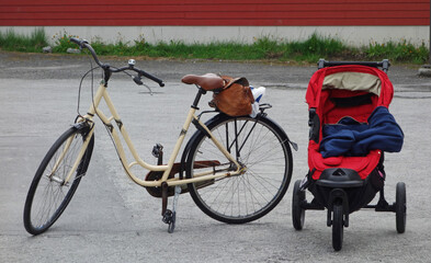 a bicycle next to a baby stroller, Nuuk, Greenland 