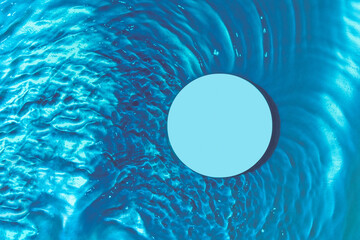 Podium top view among transparent water waves on blue background for product and cosmetic presentation. Minimal water background concept