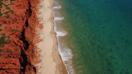 Contrasting red cliffs and blue seas