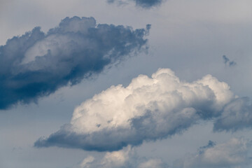 Beautiful fluffy clouds in the summer sky.