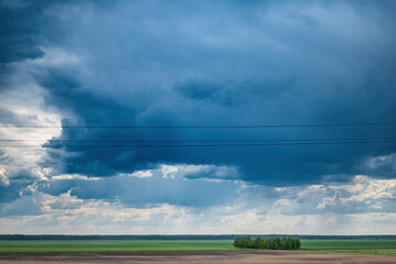 Beautiful fluffy clouds in the summer sky.