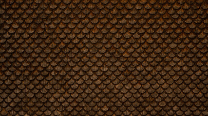 Traditional ecological  consistent cladding of a wall with brown wooden larch fish scales, wood...