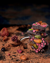 Homemade chocolate with dried berries: raspberries, strawberries and nuts