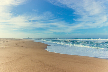 Fototapeta na wymiar sand beach and sky. atlantic ocean in portugal