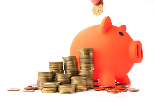 Stacking coins pile and white piggy bank for savings with money and planning step up to growing. Saving money and Grwoth business success concept.