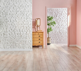 White brick wall and pink wall background style, wooden cabinet frame vase of plant decoration, furniture detail.
