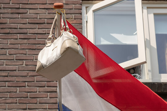Passed school exam Traditional flag en schoolbag